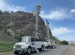 olympic electric truck helping okanogan county pud with power pole installation