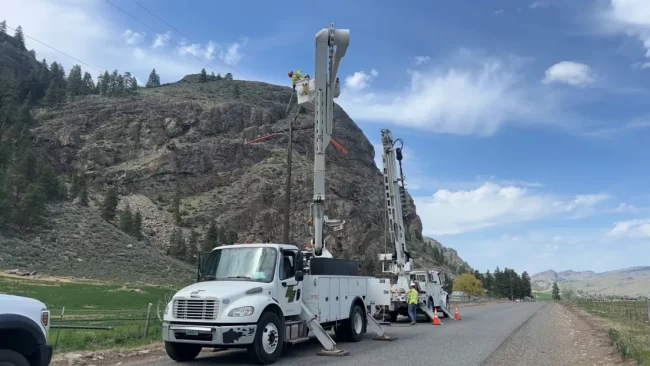 olympic electric truck helping okanogan county pud with power pole installation