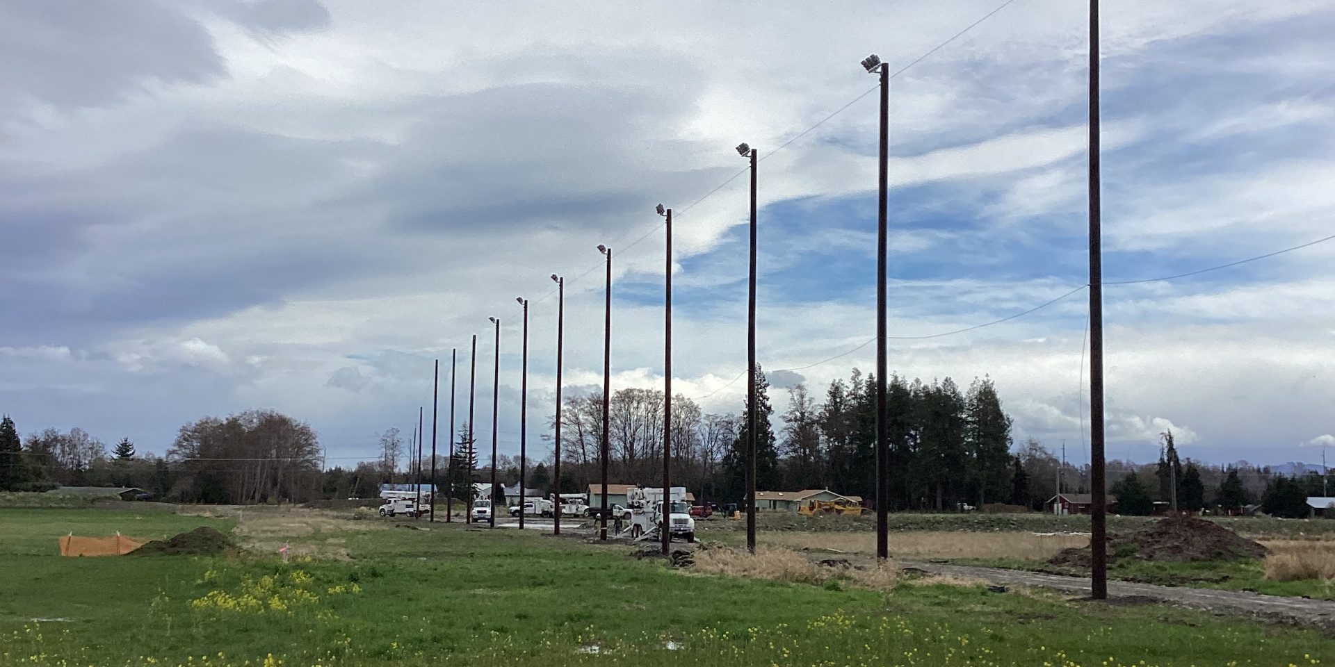 Cedars at Dungeness - 7 CEDARS DRIVING RANGE POLE SET, CONDUIT, LIGHTS AND NETTING. HYDROVAC WORK
