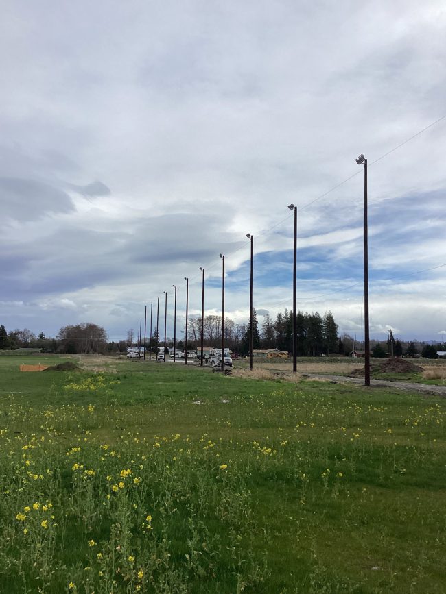 Cedars at Dungeness - 7 CEDARS DRIVING RANGE POLE SET, CONDUIT, LIGHTS AND NETTING. HYDROVAC WORK