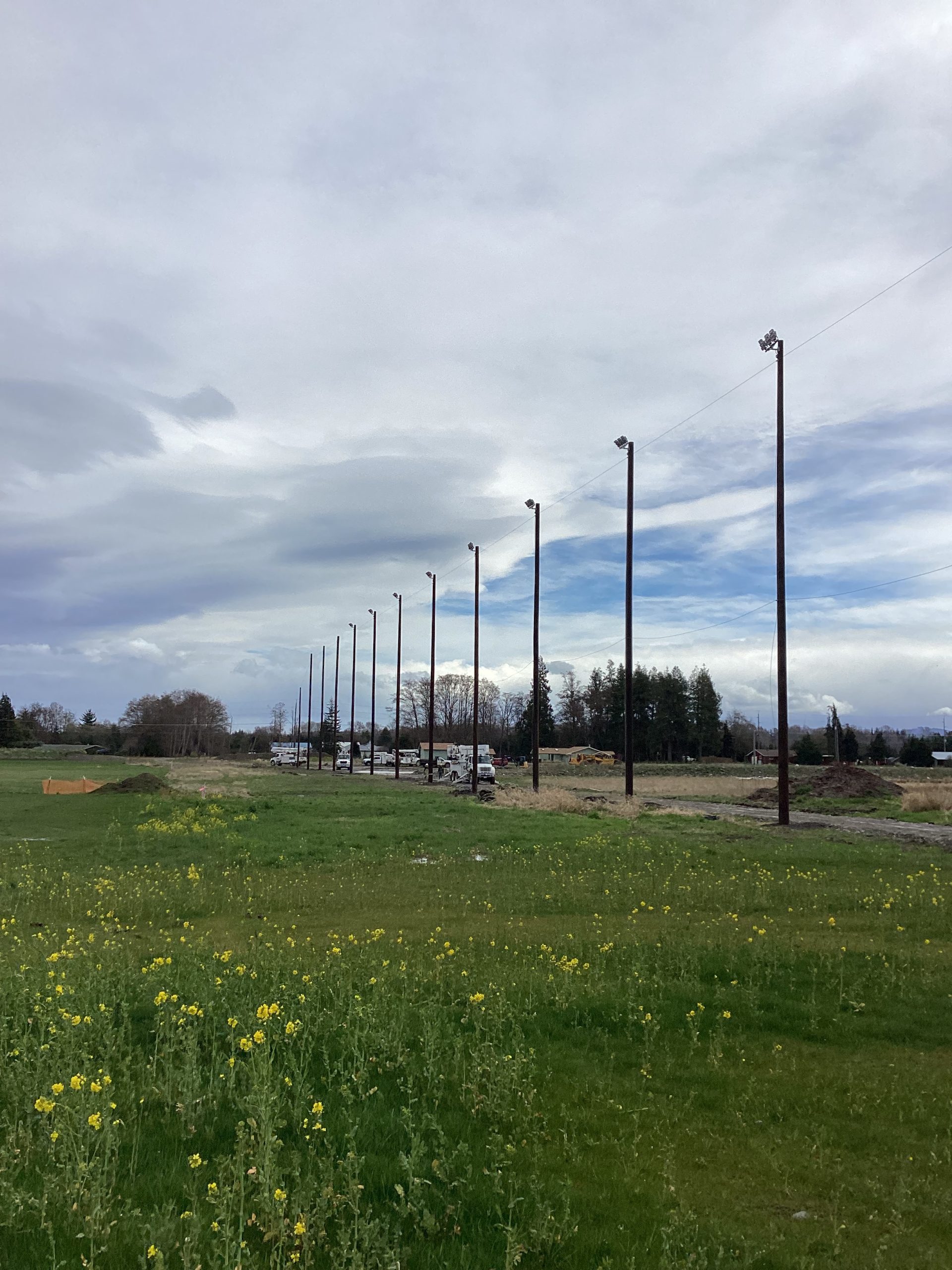 Cedars at Dungeness - 7 CEDARS DRIVING RANGE POLE SET, CONDUIT, LIGHTS AND NETTING. HYDROVAC WORK